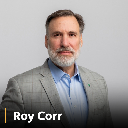 Roy Corr, man in gray suit 